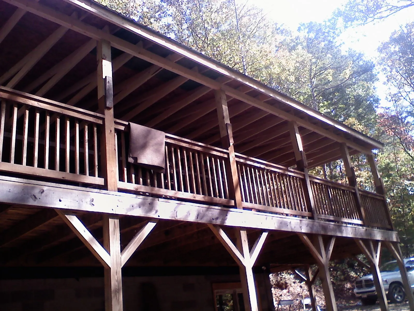 Timber framing under a new elevated porch and deck — Roof Leak Repair in Candler by Roofing Brothers